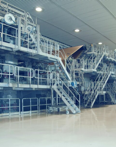 Large machine producing paper