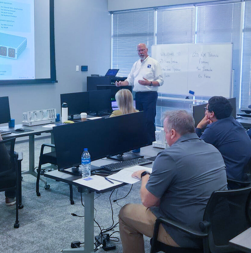People attending a KVM training